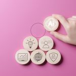 AI Artificial intelligence technology concept. Hand placed AI chip wooden block on background. AI prompt generates for business, Assists human decision-making to achieve intelligent results. Chatbot,